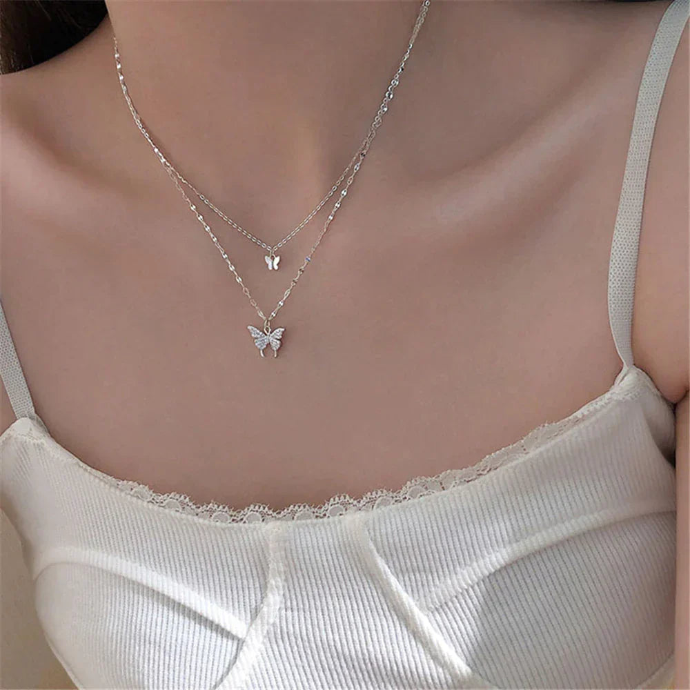 Beautiful silver butterfly necklace set, an elegant gift for her, featuring a shimmering pendant.