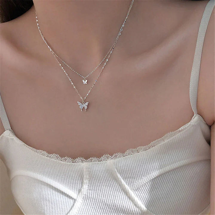 Beautiful silver butterfly necklace set, an elegant gift for her, featuring a shimmering pendant.