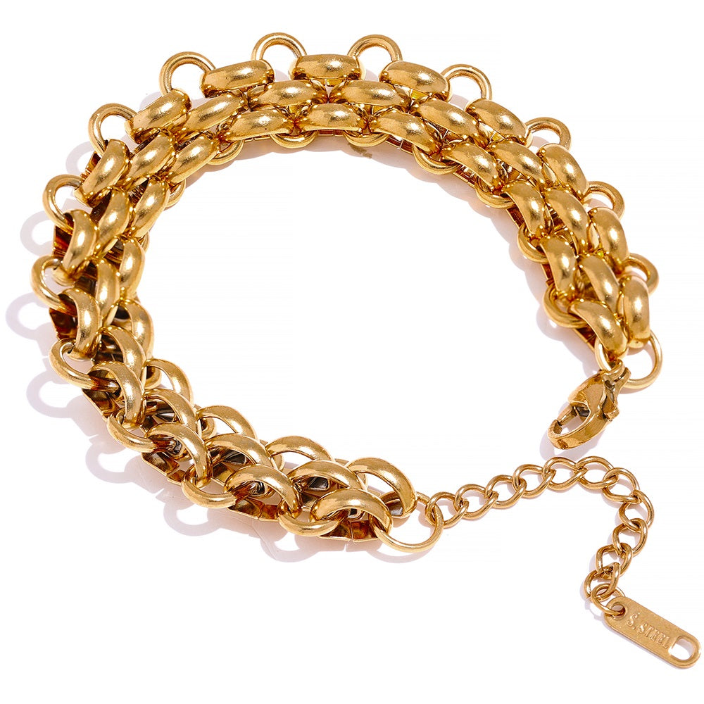 Dainty gold plated sterling silver charm bracelet for women, elegant and adjustable, a chic piece of jewelry.