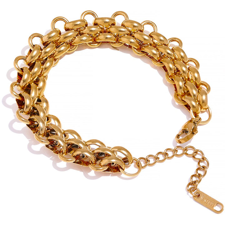 Dainty gold plated sterling silver charm bracelet for women, elegant and adjustable, a chic piece of jewelry.