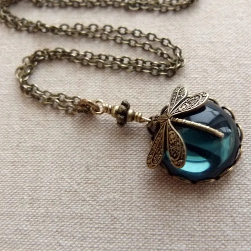 Elegant sterling silver dragonfly moonstone necklace for women. Dainty gemstone jewelry, perfect gift for her.