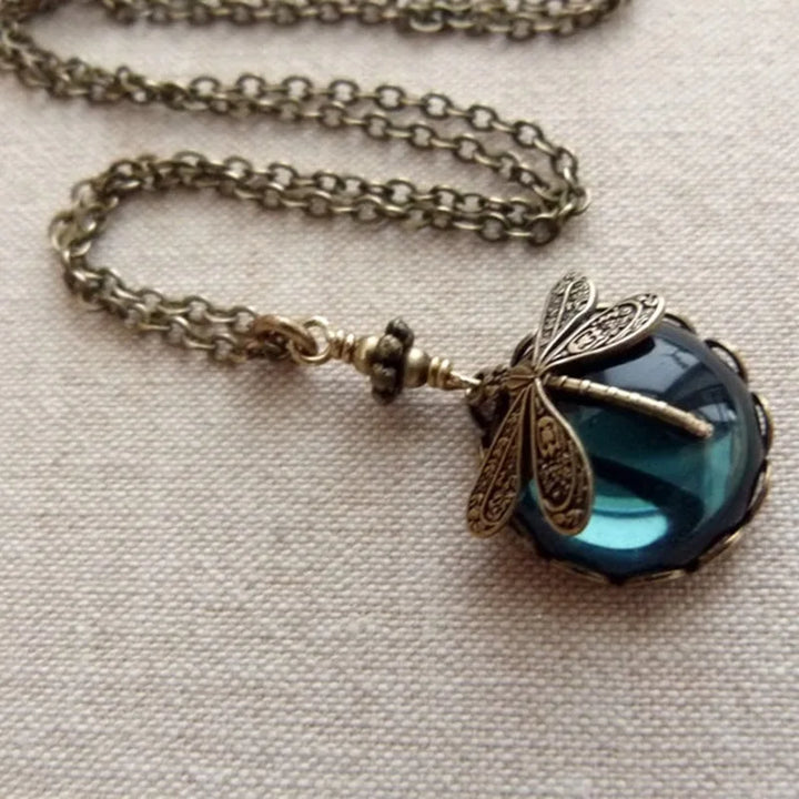 Elegant sterling silver dragonfly moonstone necklace for women. Dainty gemstone jewelry, perfect gift for her.