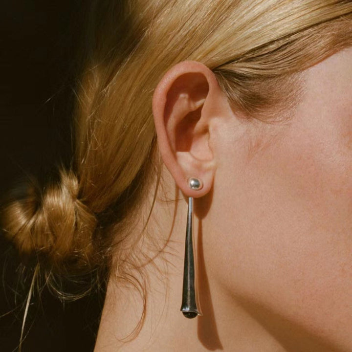Lightweight women's drop earrings, elegant sterling silver for versatile wear.
