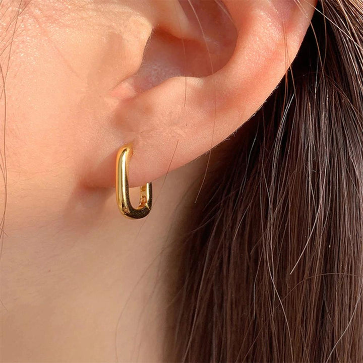 Elegant sterling silver leaf stud earrings for women, nature-inspired jewelry, perfect gift.