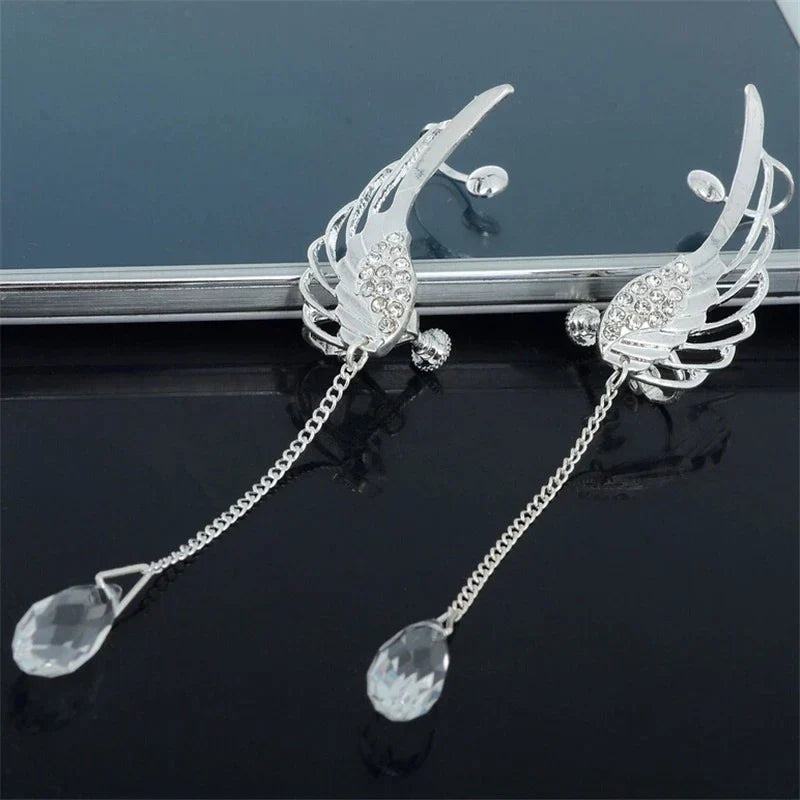 Sterling silver angel wing cuff earrings, long & elegant design for women's fashion jewelry.