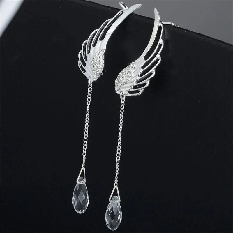 Pair of elegant women's sterling silver angel wing long cuff earrings, stylish & fashionable.