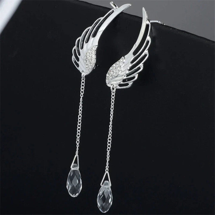 Pair of elegant women's sterling silver angel wing long cuff earrings, stylish & fashionable.