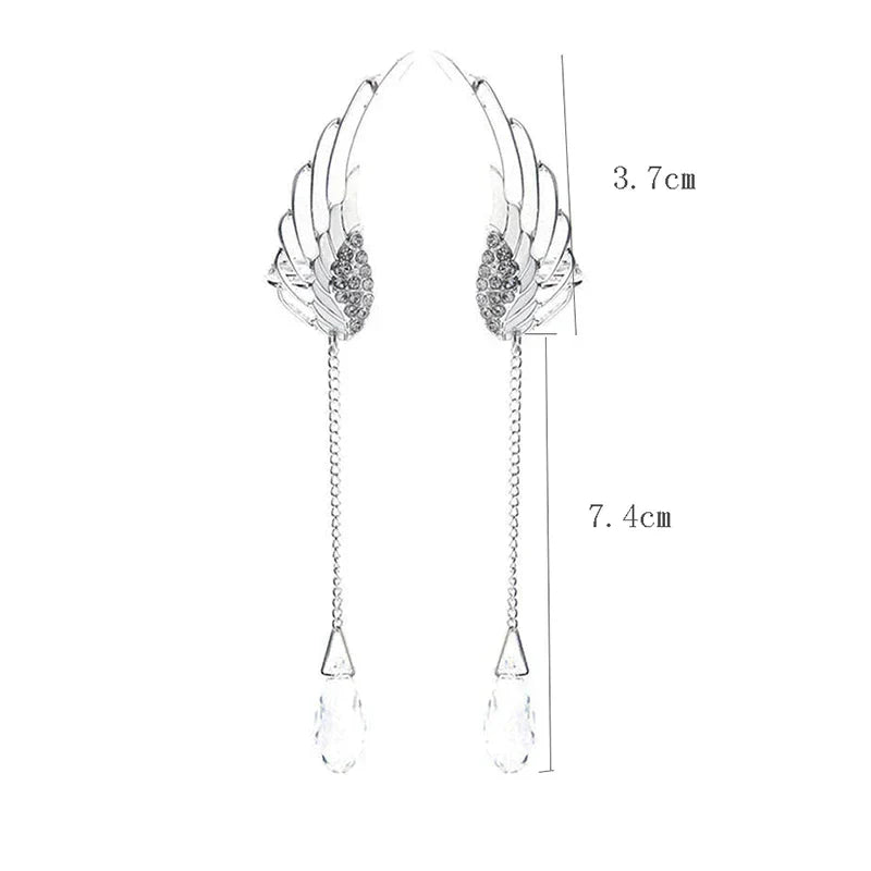 Stunning sterling silver long cuff earrings with elegant angel wing design, perfect women's jewelry.