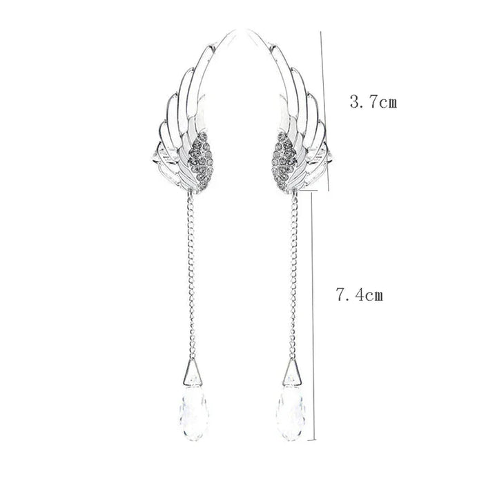 Stunning sterling silver long cuff earrings with elegant angel wing design, perfect women's jewelry.