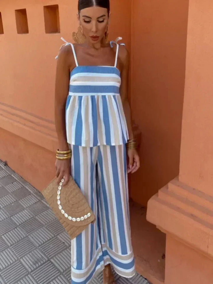 Elegant striped wide leg wedding guest dress, a chic two-piece outfit for summer occasions.