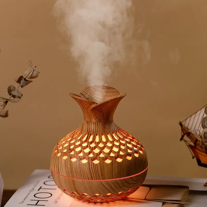 Elegant ultrasonic aroma diffuser creating a relaxing mist for modern home or office decor.