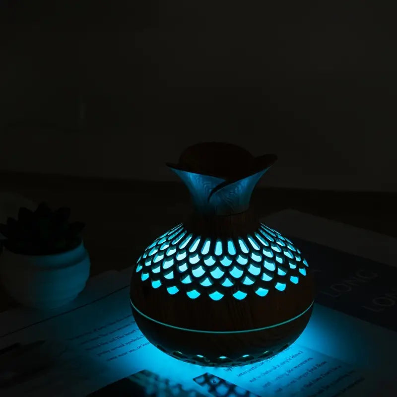 Elegant design ultrasonic aromatherapy diffuser, ideal for essential oils in living spaces.