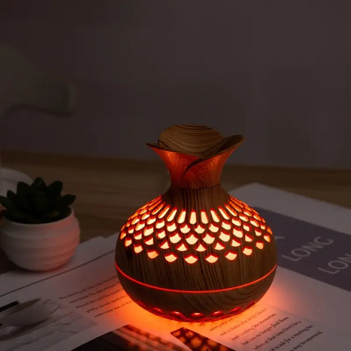 Decorative ultrasonic diffuser, AromaBloom, adds a stylish touch and improves mood with essential oils.