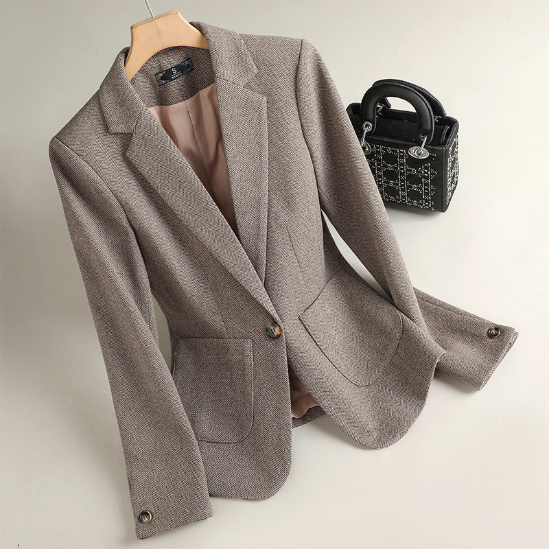 Elegant unisex tailored blazer jacket, perfect for professional business wear or smart casual occasions.