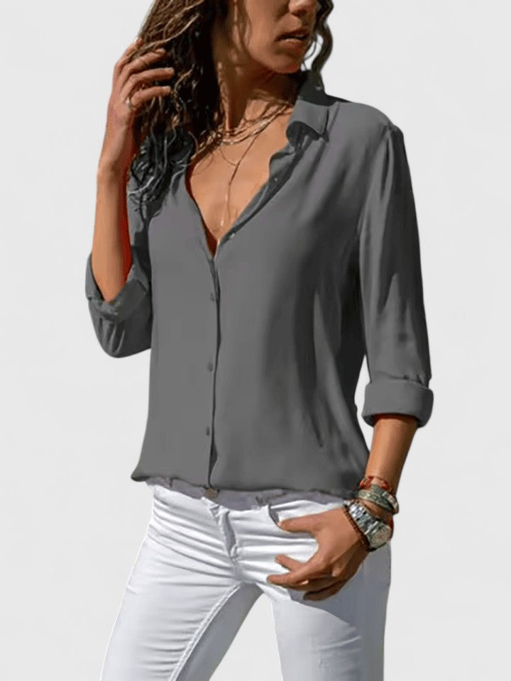 Classic ladies V-neck blouse, comfortable & elegant for office or casual outfits.