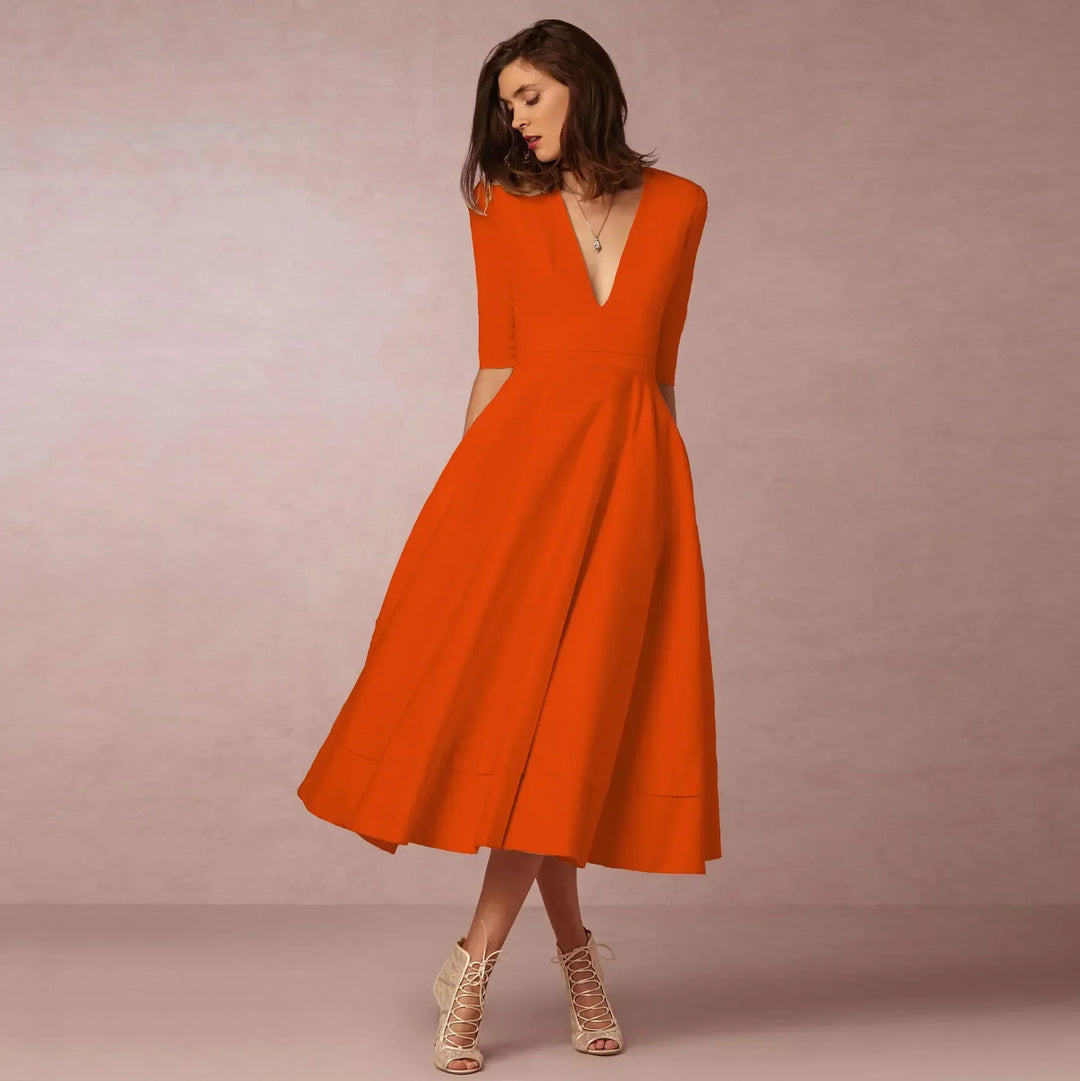 Detail: Elegant V-neck & elbow sleeves on a women's midi dress, perfect for timeless style.
