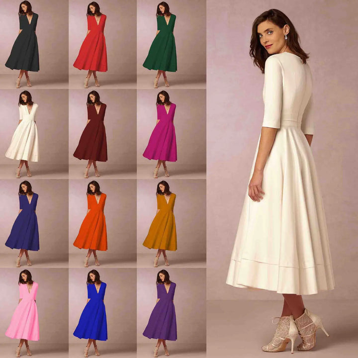 Women's elegant V-neck elbow-sleeve midi dress, styled for versatile casual and formal fashion.
