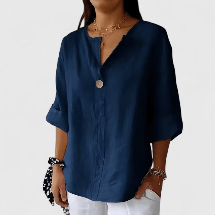 Comfortable women's elegant V-neck blouse with a trendy knot design, great for relaxed summer wear.