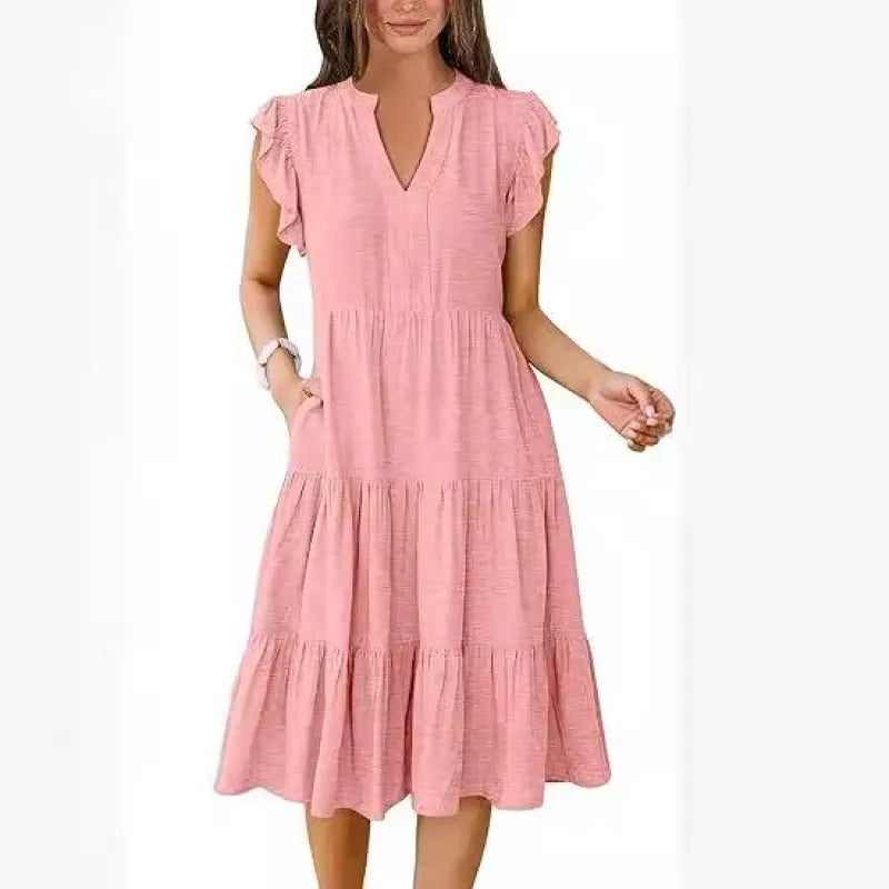 Flowy tiered midi dress with a flattering V-neck and delicate flutter sleeves, ideal for comfortable spring/summer style.