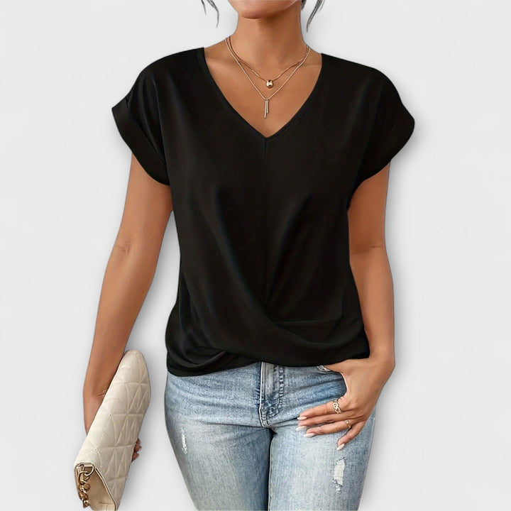 Stylish long-sleeve V-neck blouse for women, elegant design, casual chic with functional button detail.