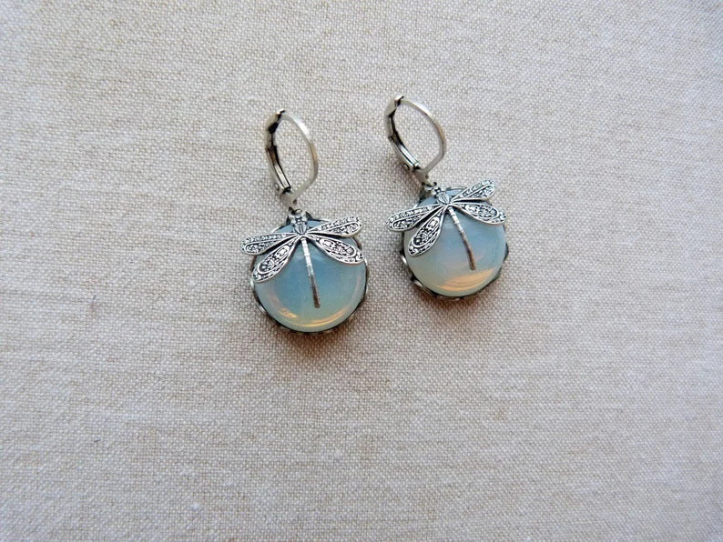 Intricate vintage butterfly stud earrings for women, elegant and romantic jewelry from the Aurora Collection.
