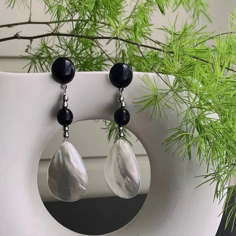 Pearlescent vintage shell drop earrings, exquisite women's jewelry with a classic retro design.