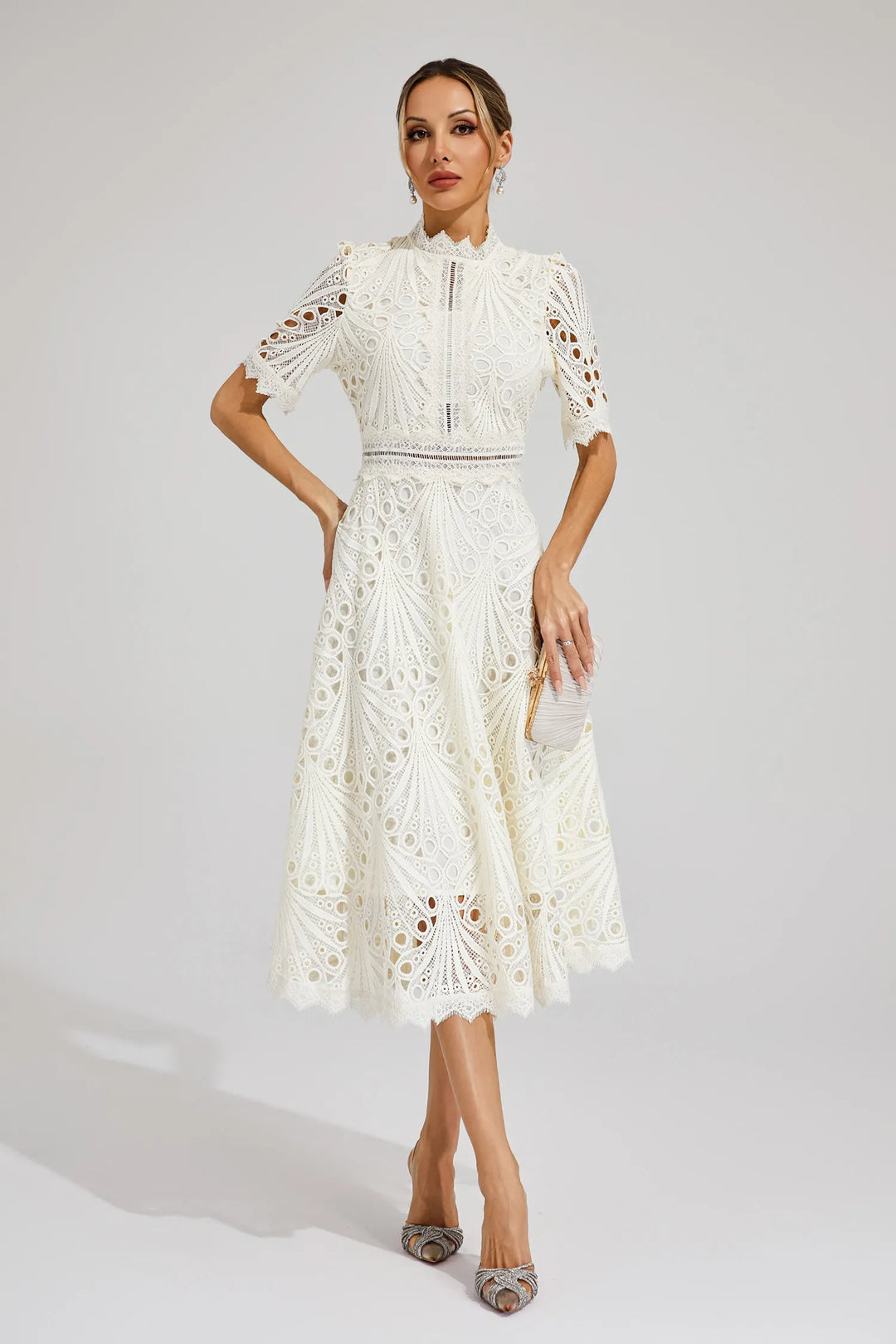Timeless elegant white lace midi dress, a classic choice for women's special occasion wear.
