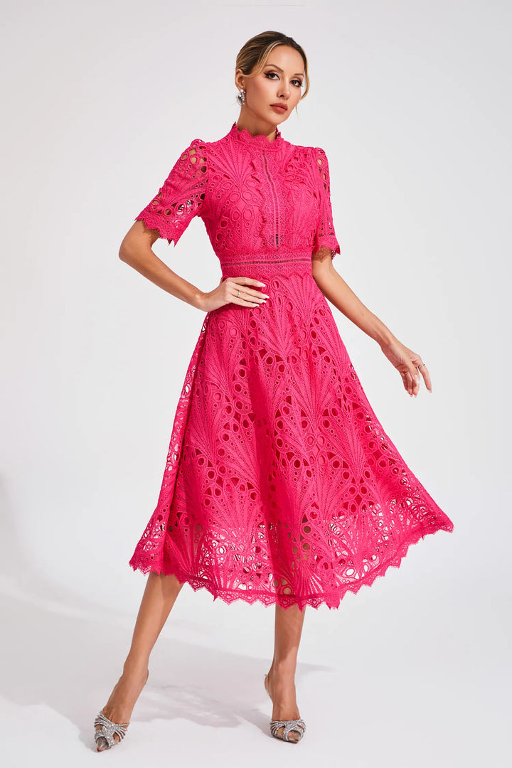Chic white midi dress with intricate lace detail, perfect for women's special occasions.