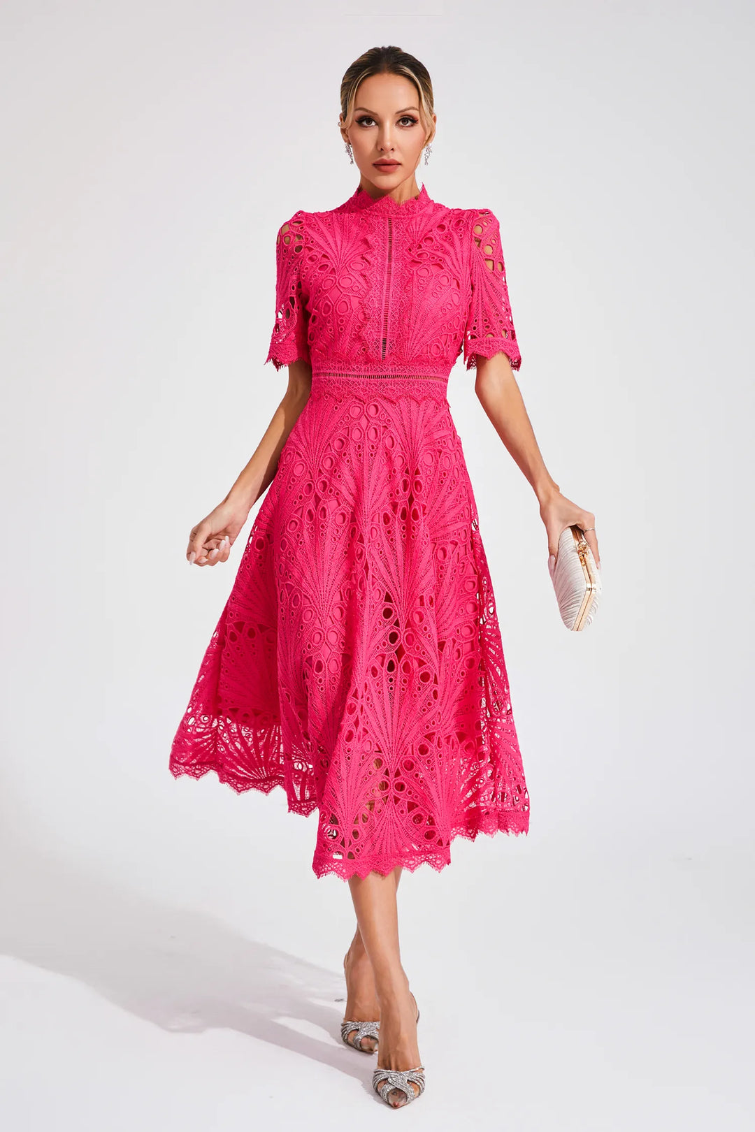 Stylish hot pink lace cocktail dress for women, elegant evening wear with tailored fit.