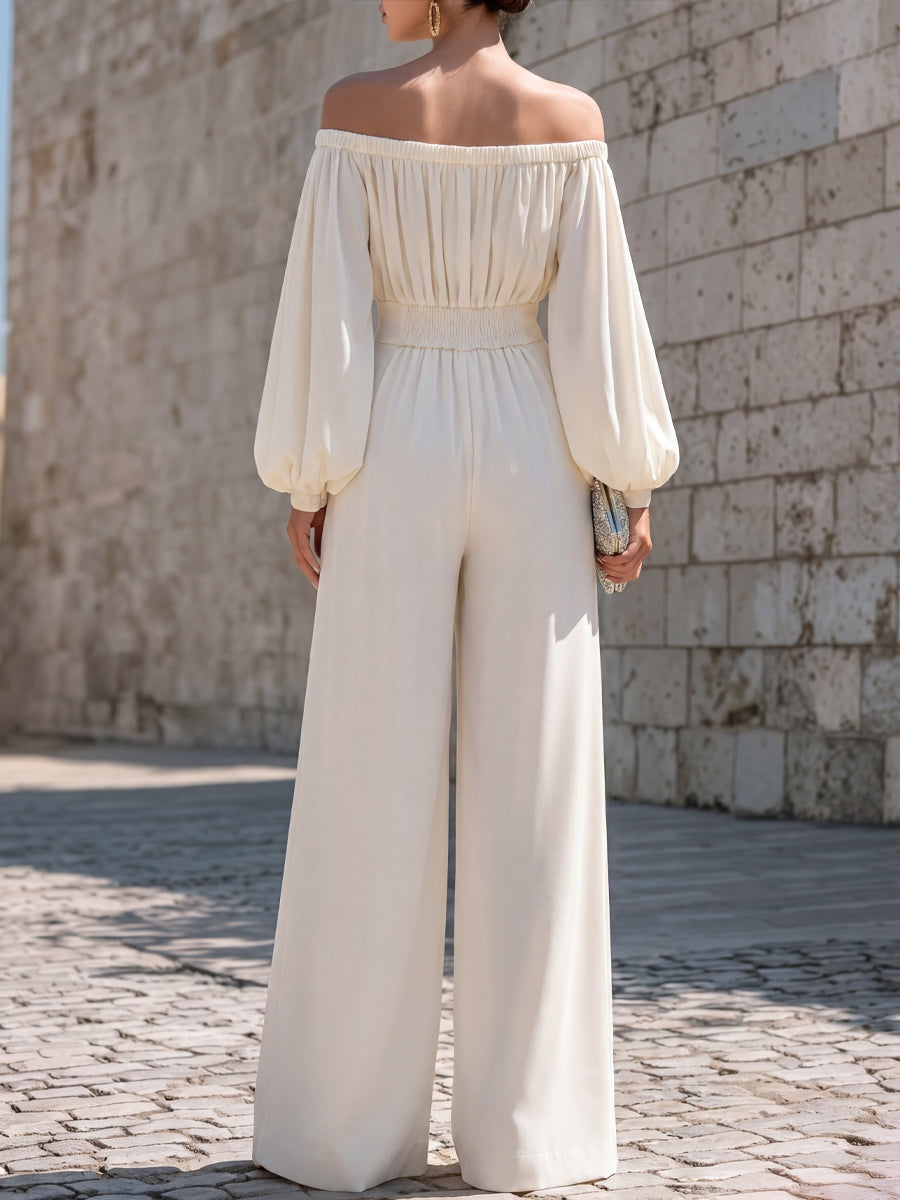 White off-shoulder maxi dress with bishop sleeves, ideal for wedding guests, parties, or resort wear. Elegant summer style.