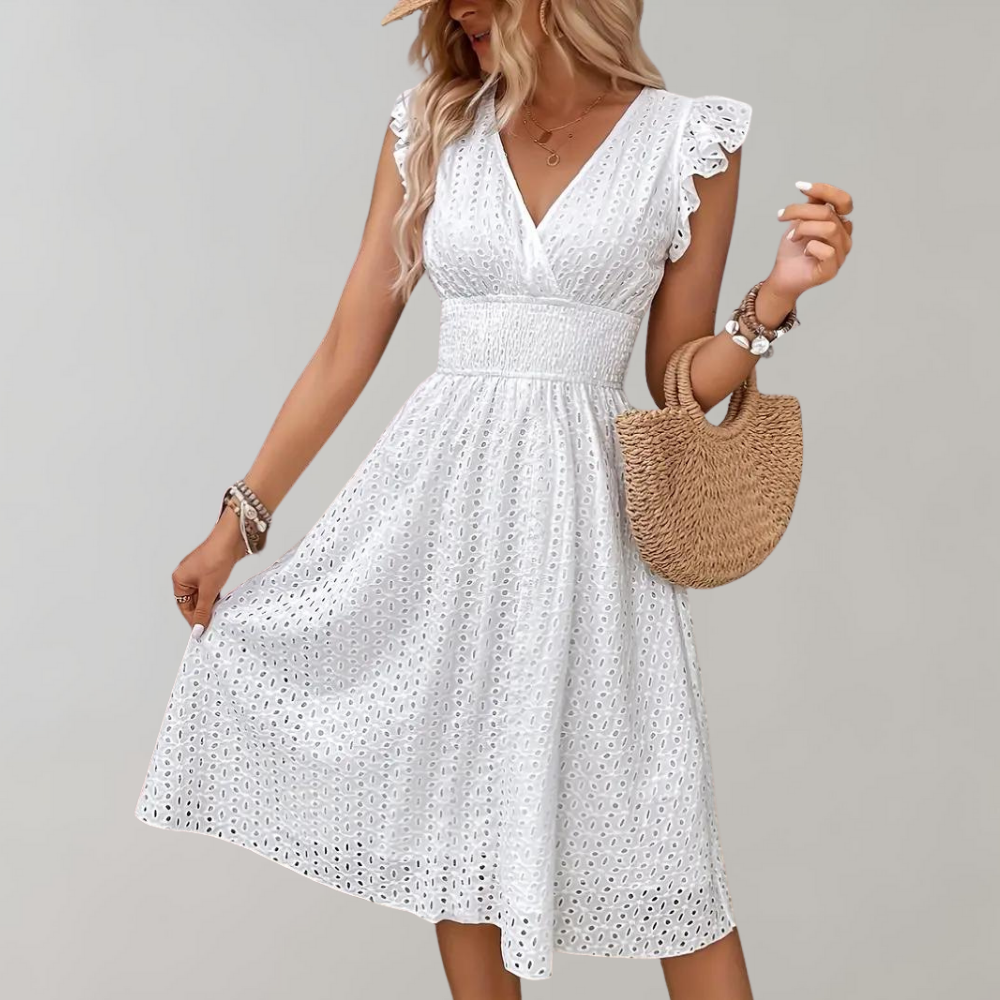Elegant white summer dress for women with stylish ruffled short sleeves and a flowy, comfortable design.