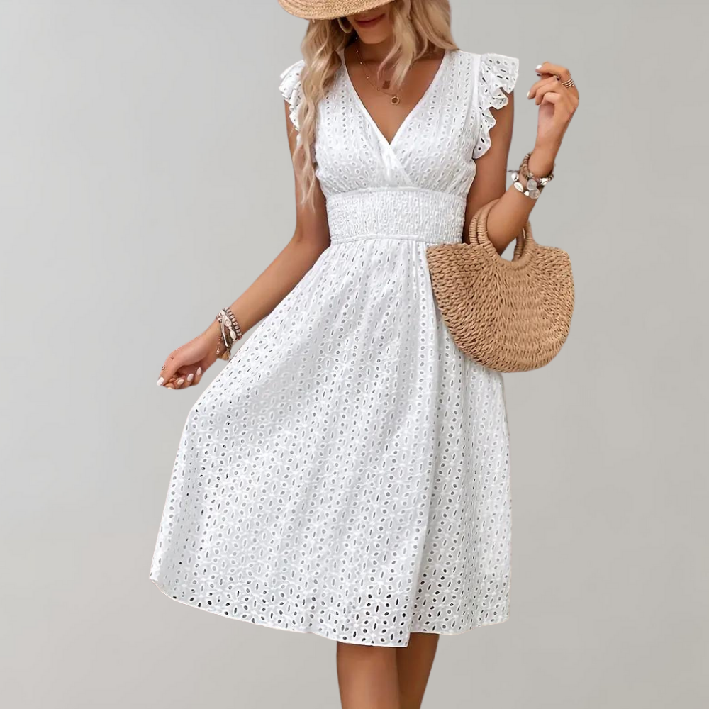 Versatile white casual dress with ruffled sleeves, perfect for summer days, vacations, or elegant events.