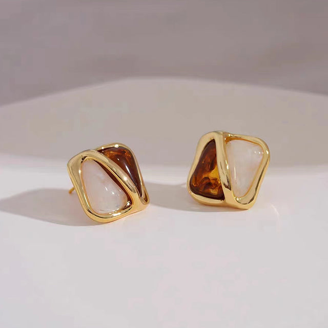 White teardrop dangle earrings for women. Elegant gold-plated love-inspired jewelry from Love Collection.