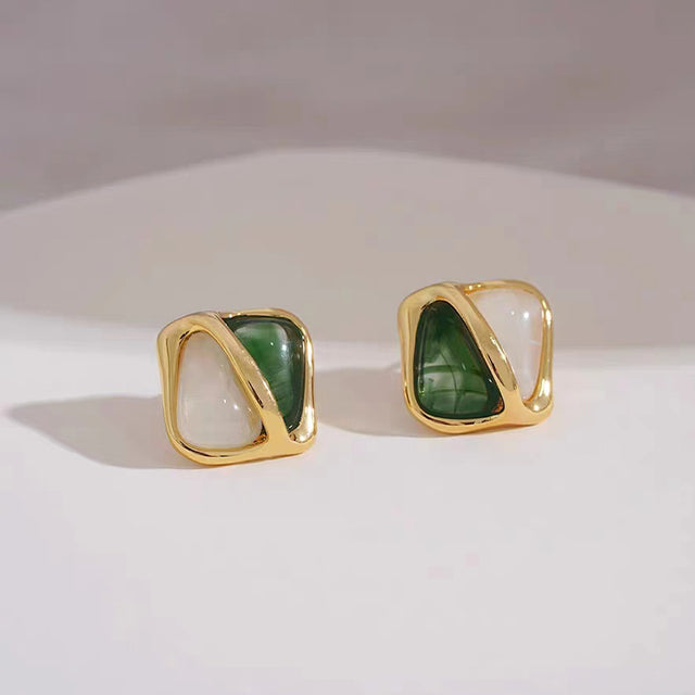 Love Collection elegant white teardrop dangle earrings for women. Gold-plated fashion jewelry accessory.