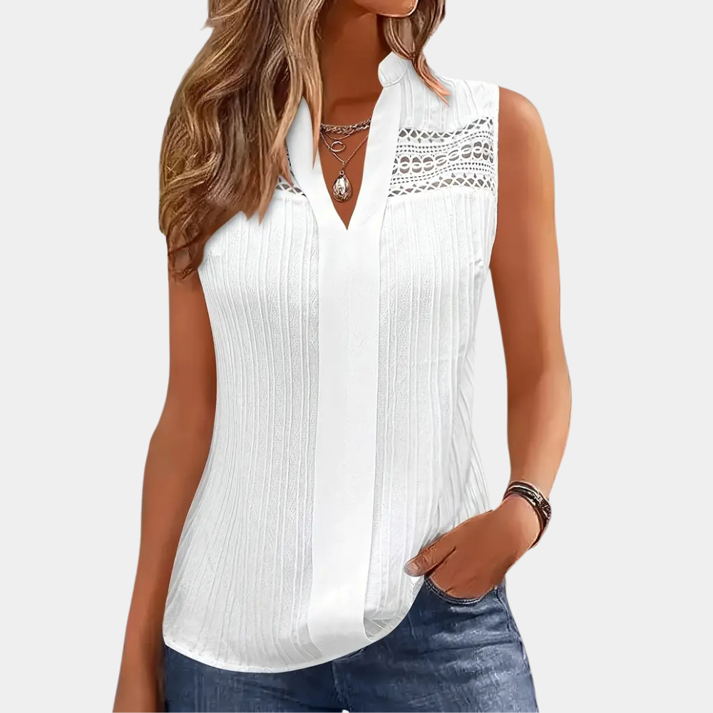 Elegant white women's top, versatile for casual or formal wear. A classic, chic, and comfortable addition to any wardrobe.