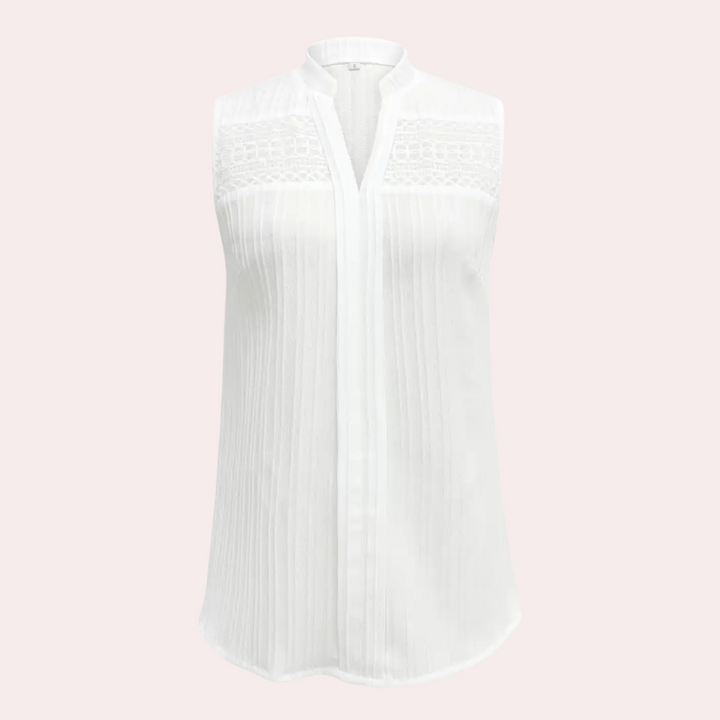 Stylish white top for women, perfect for everyday comfort & chic feminine looks. Timeless classic fashion.