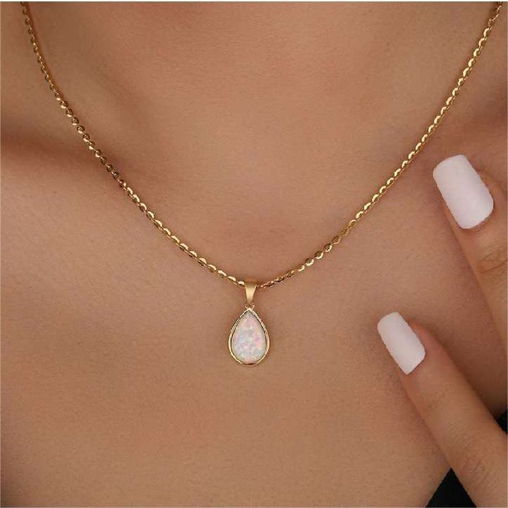Stunning 18K gold adjustable necklace for women, featuring a vibrant natural opal drop pendant.