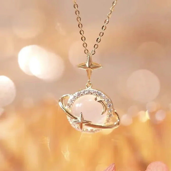 Trendy women's gold planet pendant necklace, 18k gold plated celestial jewelry fashion accessory.