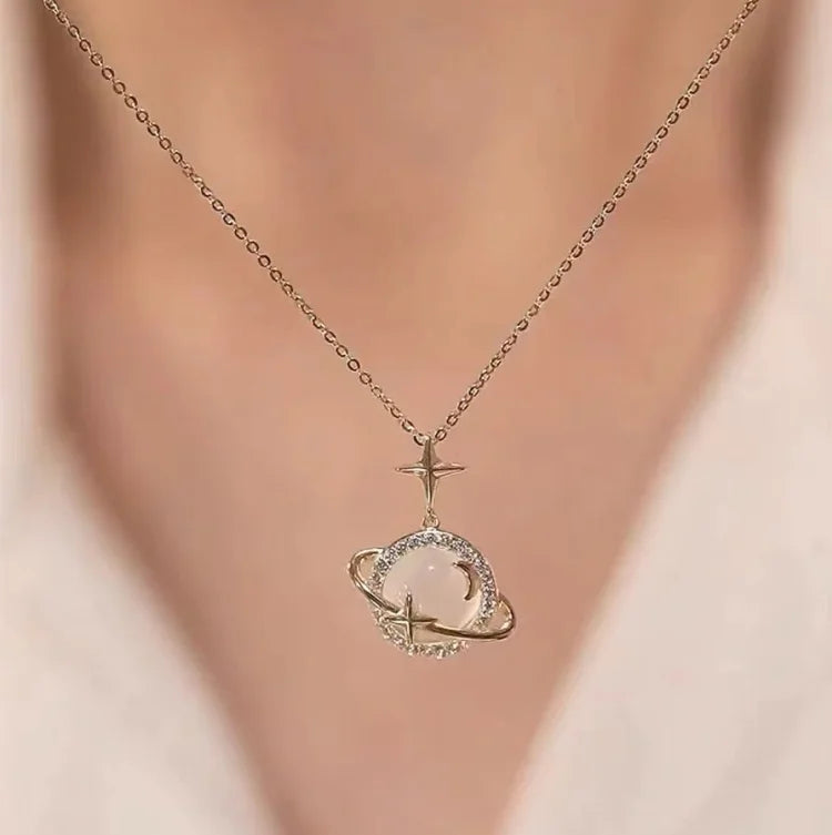 Unique celestial gold planet necklace for women, 18k gold plated sterling silver, elegant and stylish.