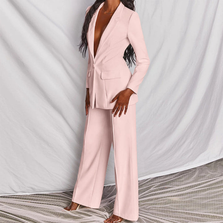 Sophisticated women's blazer and trouser set, a stylish matching outfit for work or evening.