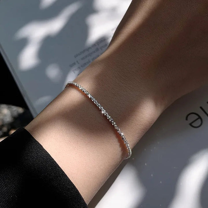 Elegant women's 925 silver liquid shine bracelet, adjustable & hypoallergenic. Perfect refined versatile jewelry.