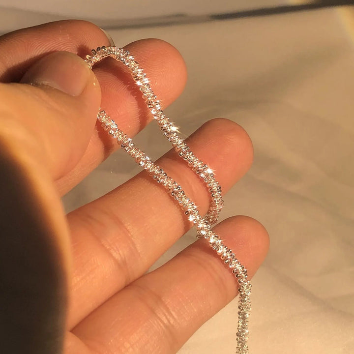 Women's silver liquid shine bracelet, 925 sterling for elegant, refined jewelry style. Hypoallergenic design.