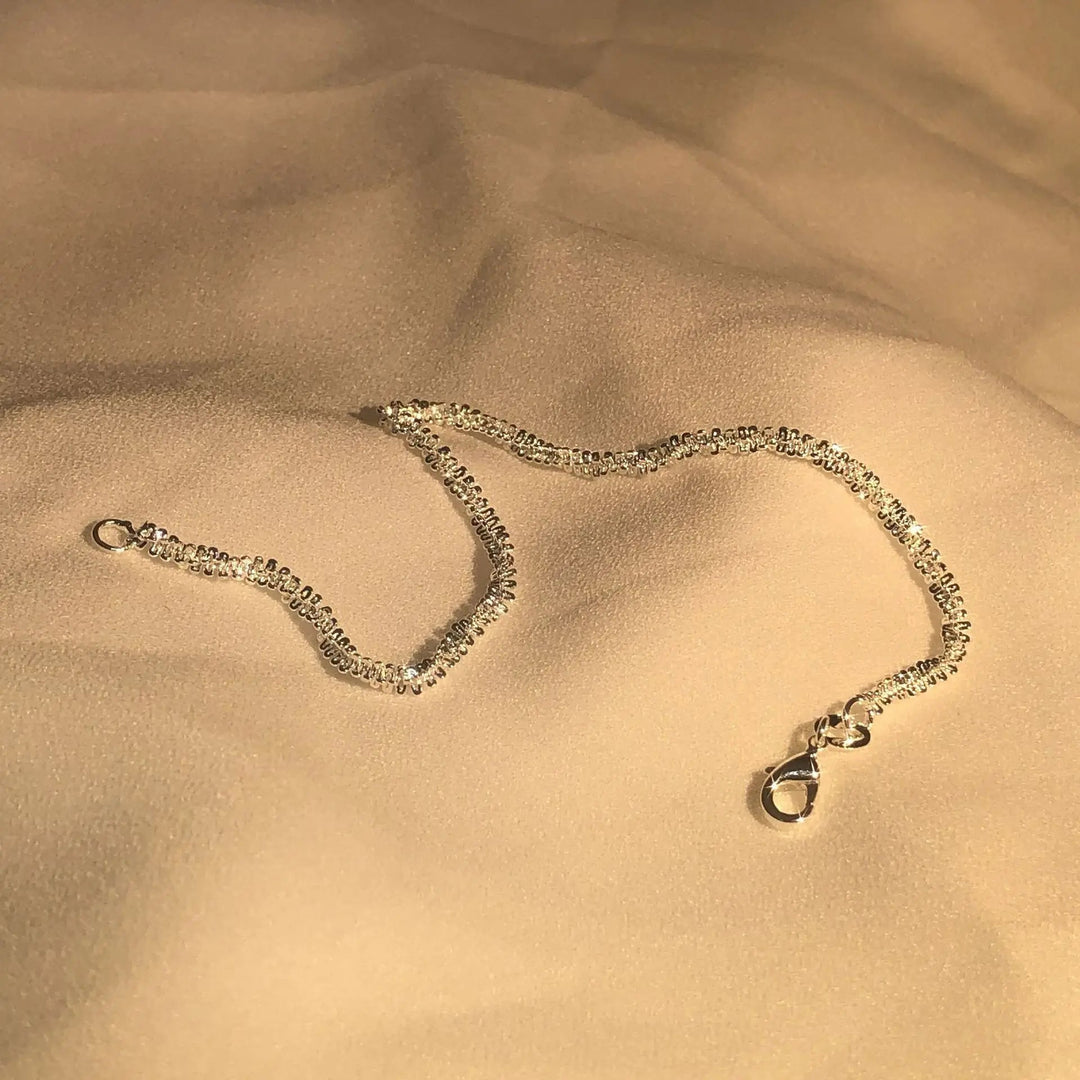 Stunning women's 925 silver liquid shine bracelet. Elegant, adjustable, hypoallergenic, refined silver jewelry.