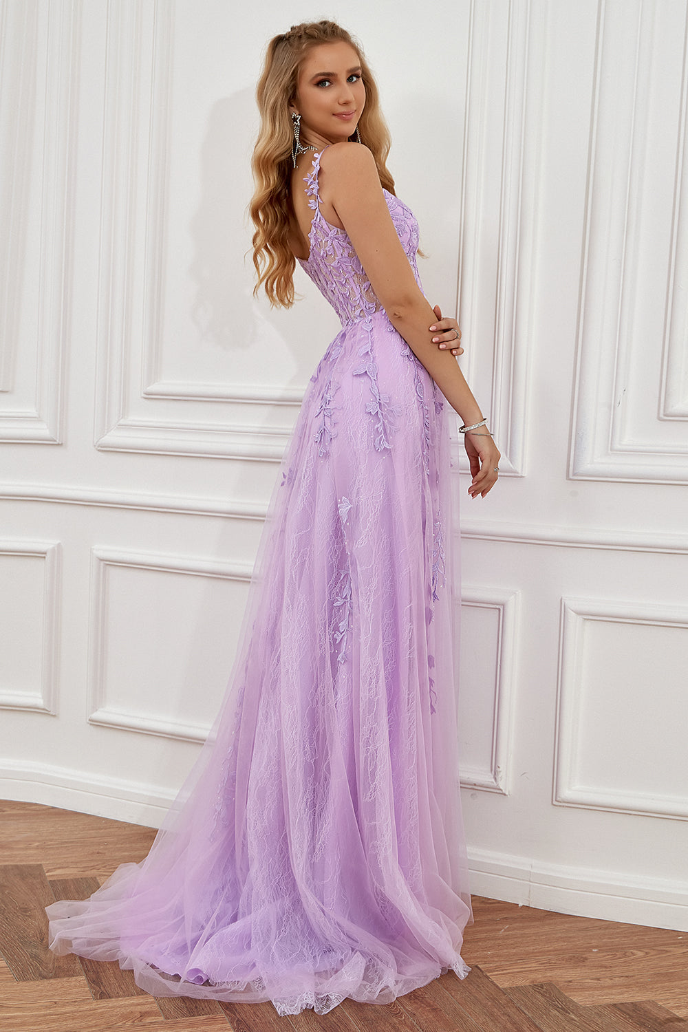 Close-up of intricate appliqué on an elegant women's A-line ball gown, perfect for formal events.