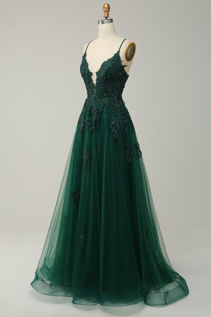 Side view of a long A-line prom dress for women, spaghetti straps, flowing silhouette. Wedding guest attire.
