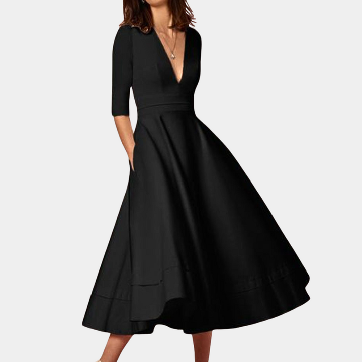 Versatile women's sleeveless A-line midi dress with side slit, ideal for comfortable casual or everyday wear.