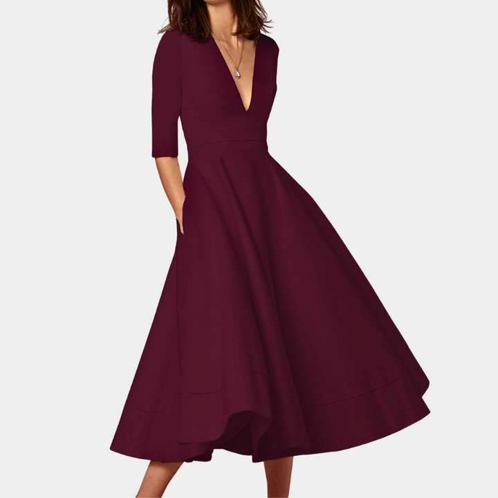 Sleeveless A-line midi dress for women, elegant and versatile with a side slit, perfect for spring/summer.