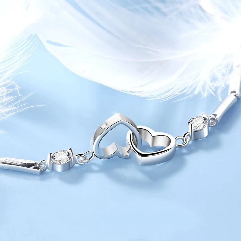 Lovely sterling silver double heart bracelet, an adjustable and elegant gift for women. Hypoallergenic.