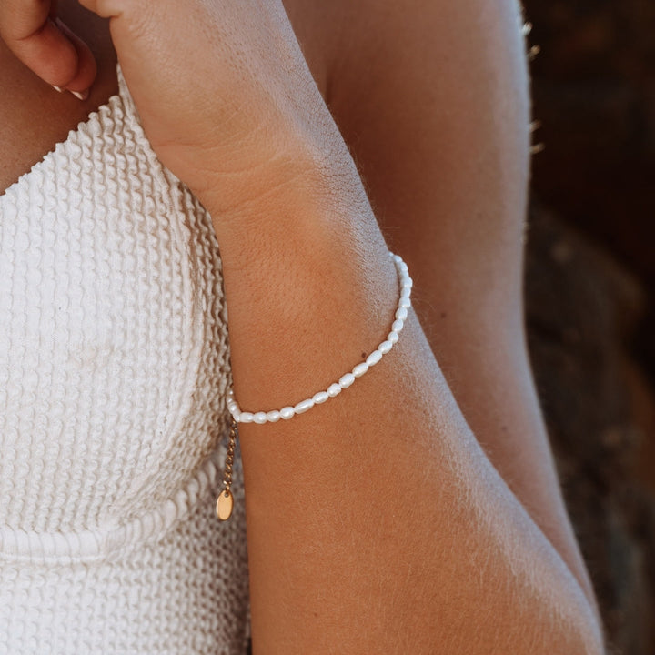 Elegant women's adjustable bracelet with freshwater pearls & gold plating. Hypoallergenic & water resistant jewelry.