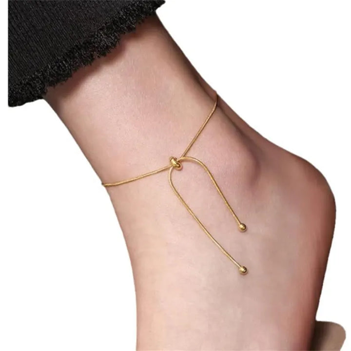 Chic adjustable chain anklet for women, a versatile piece of foot jewelry adding elegant flair.